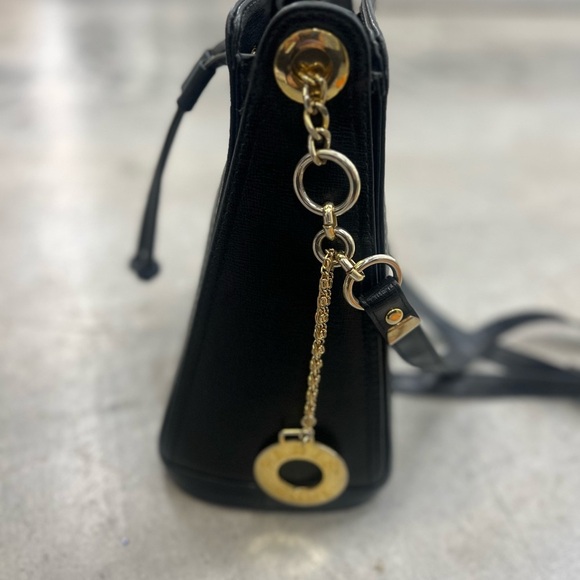 Small Black Crossbody Bag with Gold Accents and Drawstring Closure - Picture 9 of 13